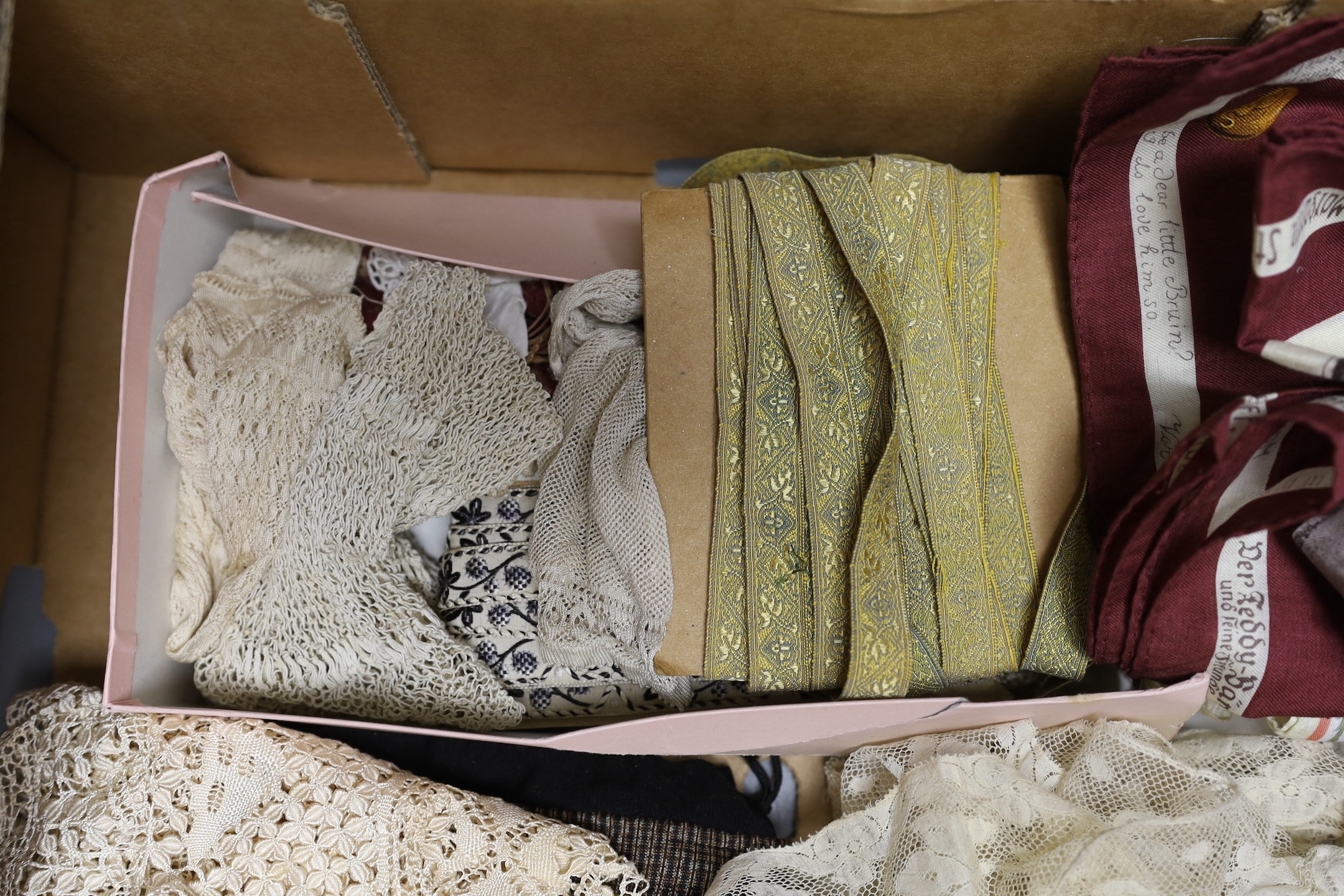 An unusual Steiff commemorative scarf, a collection of Victorian and later ribbons and a length of early 19th century fine bobbin lace, silk Maltese lace and silk mittens, etc.